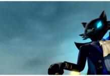 Anime Elites Squad Mythics Tier List feature image for our anime elites squad mythics tier list which shows a cat with a glowing blue eye from a bottom-up view. He is wearing fancy victorian style clothes and a grey-blue cloudy sky is in the background