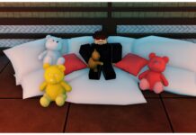 Jujutsu Tycoon Traits Guide Feature image for our Jujutsu Tycoon Traits guide showing the traits npc sitting on a bed of white cushions surrounded by various colourful teddy bears