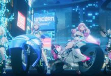 Chasing KaleidoRider Features Motorbike Racing Cyberpunk Anime Girls 4 of the characters from Chasing Kaleidoriders as they sit on their motorbikes in the middle of a cyberpunk-style city as they look up at something in the game's PV trailer.