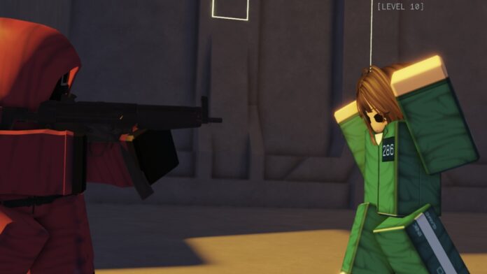 Feature image for our Ink Game Squid Game guide. Image shows someone in a hood pointing a gun at someone who has their arms up.