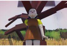 How To Kill in Ink Game Feature image for our how to kill in ink game guide showing the red light green light robotic doll facing the sand